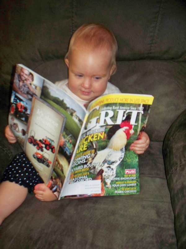 Little Cierra enjoys paging through her parents’ GRIT.
